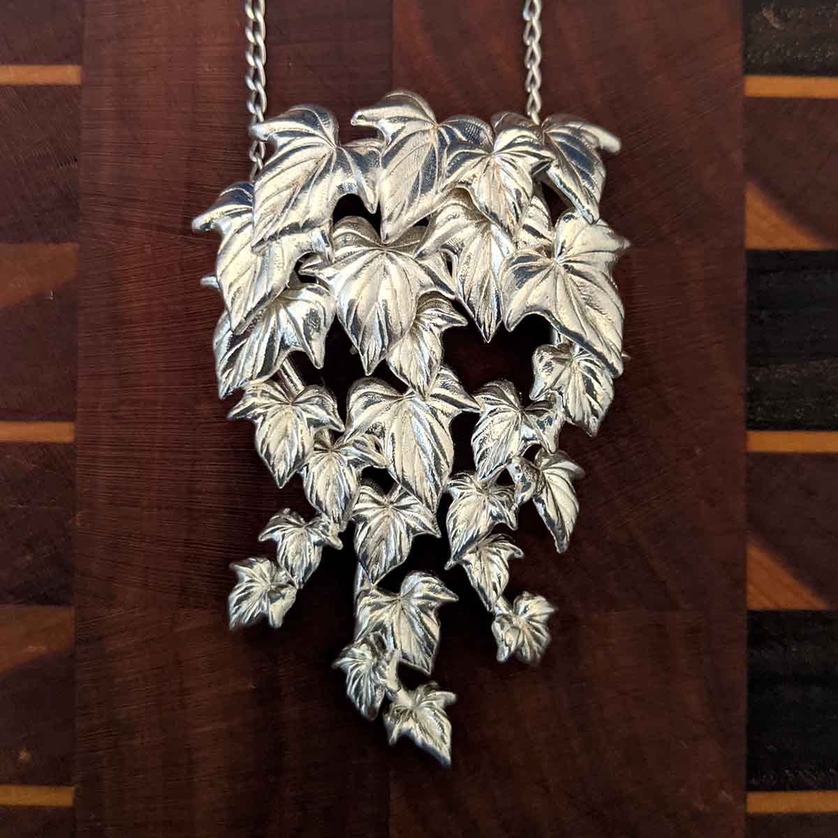    Photo-of-Large-Natural-Satin-Finish-Solid-Sterling-Silver-Flowing-Vine-Pendant-Front-Side-Showing-Flowing-Ivy-Vines