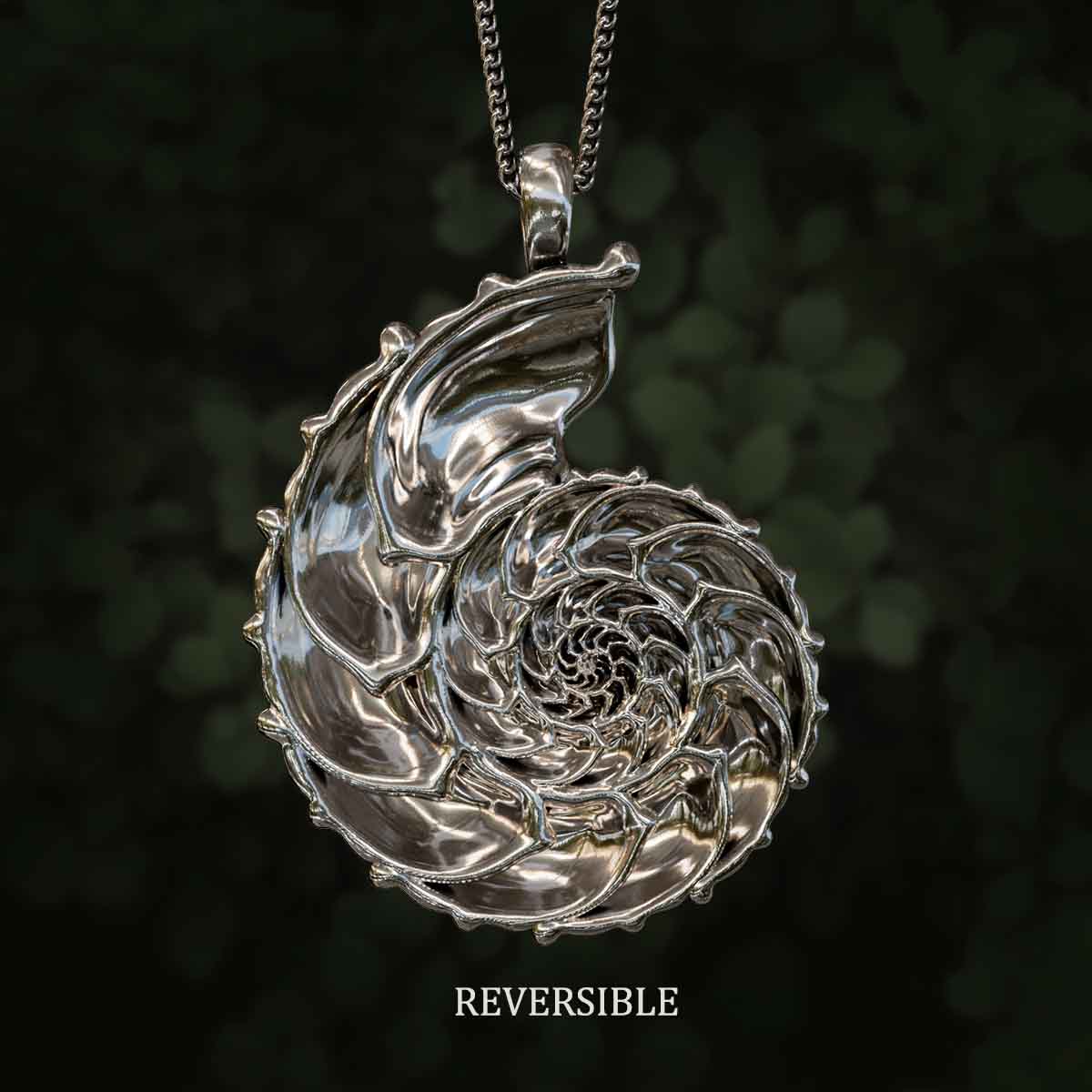 This pendant is reversible. 